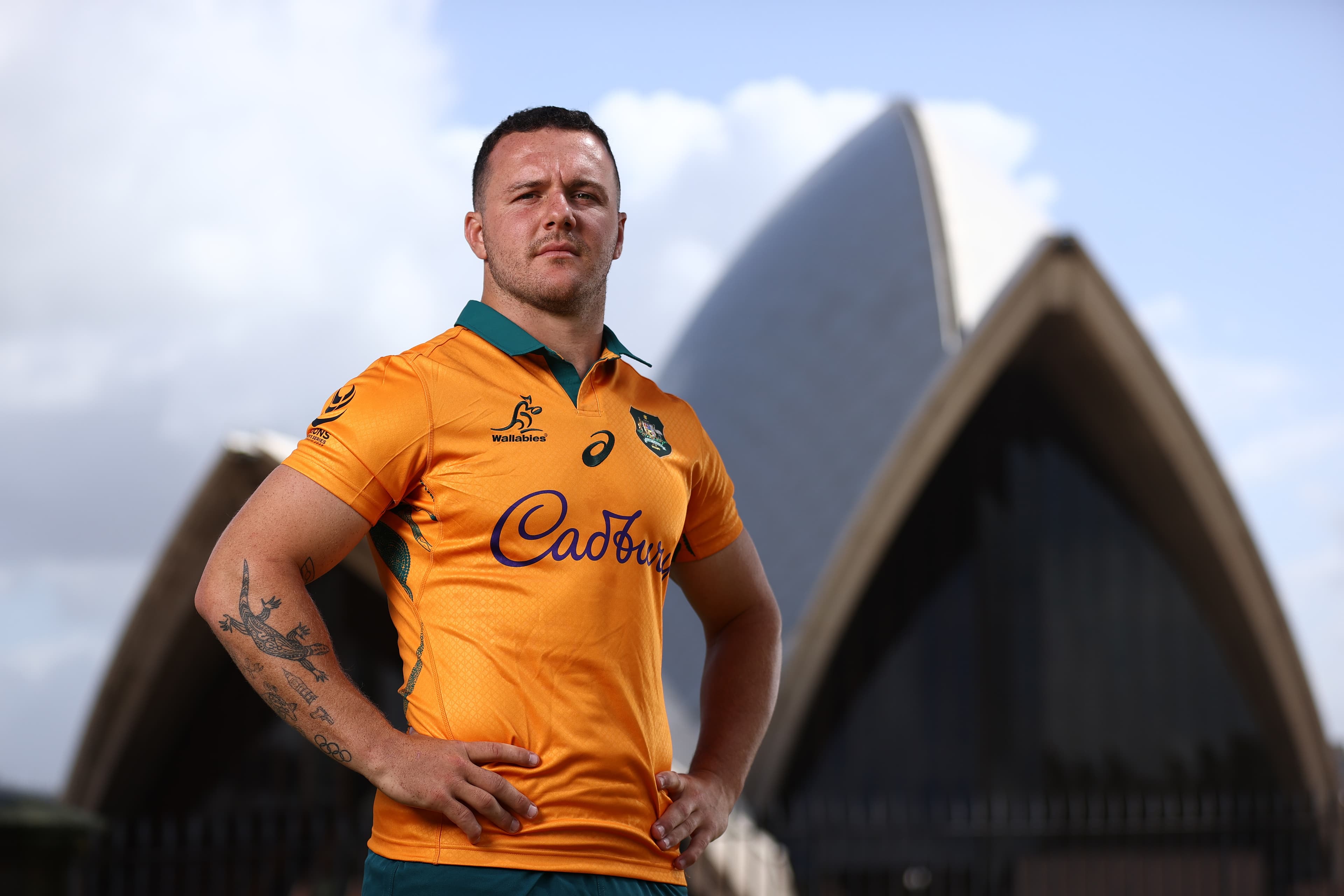 Dylan Pietsch models the new jersey, which features his artwork as part of the design. Photo: Getty Images