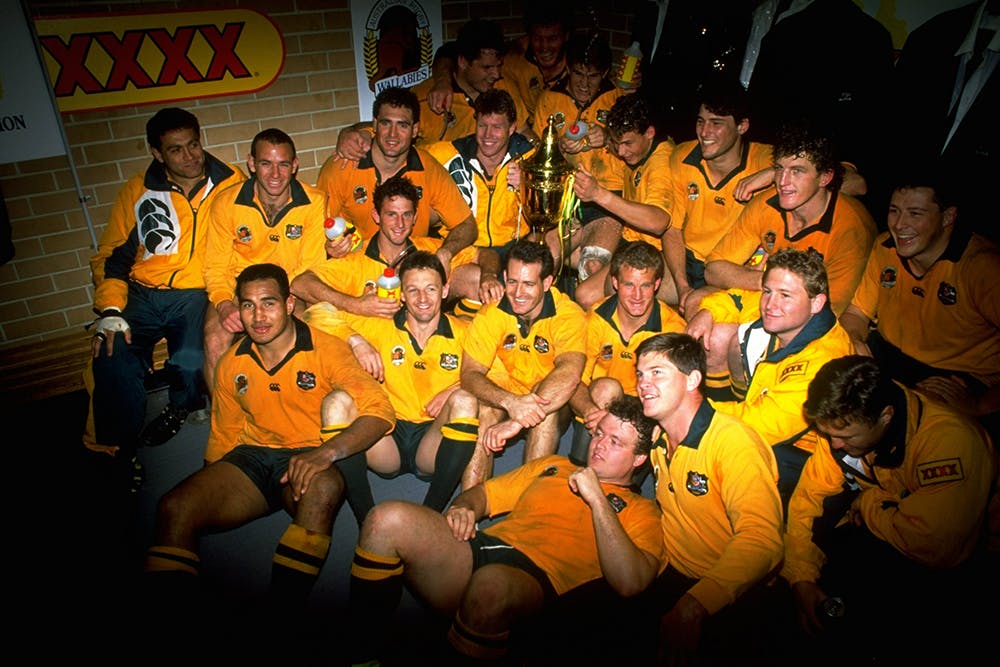 The 1991 Wallabies squad celebrate a win over England in Sydney. Photo: Getty Images