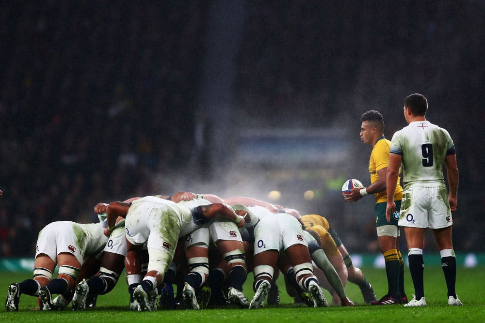 Wallabies and England play out a gruelling contest. Photo: Getty Images