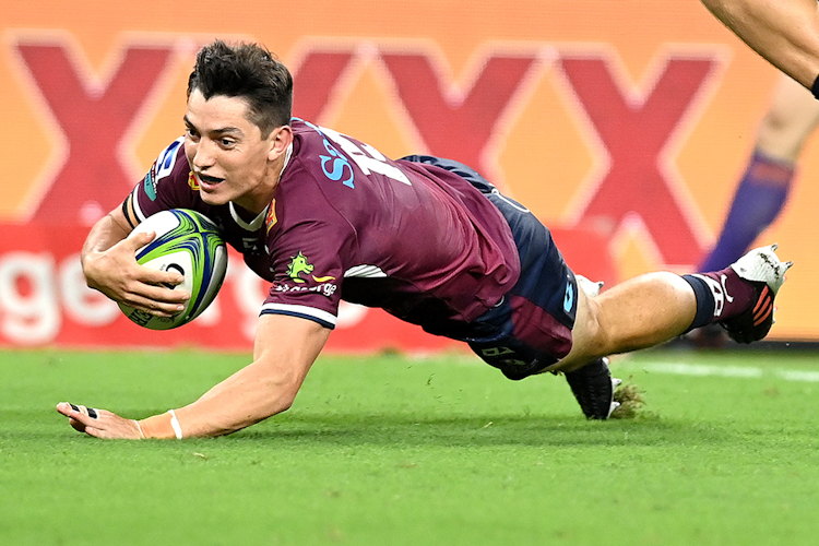 Jock Campbell scores a try for the Queensland Reds. Photo: Getty Images